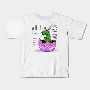 Little cute green dinosaur with rabbit ears looking for rabbit before easter holiday cry  t-shirt Kids T-Shirt